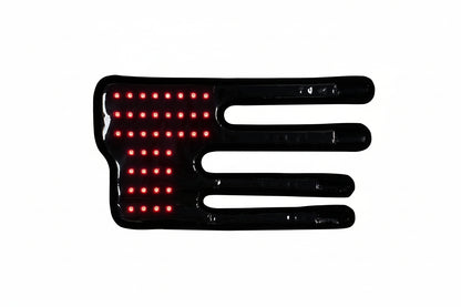 Black LED leg wrap for your pet with red lights turned on a white background